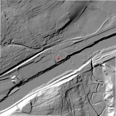 Shaded relief map of the ground around NE418DX, computed from Environment Agency LiDAR. The ground here sits at about 11 m above sea level and falls 36 m across the surrounding 800 m. Surface water reaching this point runs off ground lying to the west, 5.5 m higher.