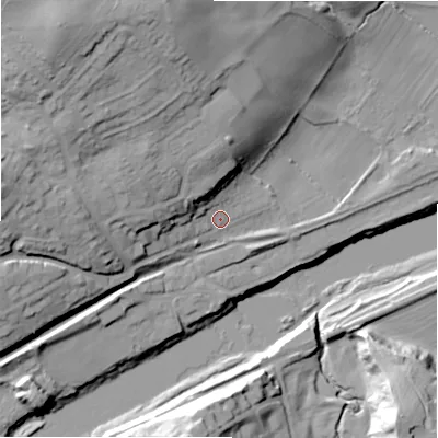 Shaded relief map of the ground around NE418EE, computed from Environment Agency LiDAR. The ground here sits at about 12 m above sea level and falls 38 m across the surrounding 800 m. Surface water reaching this point runs off ground lying to the north-west, 28.9 m higher.