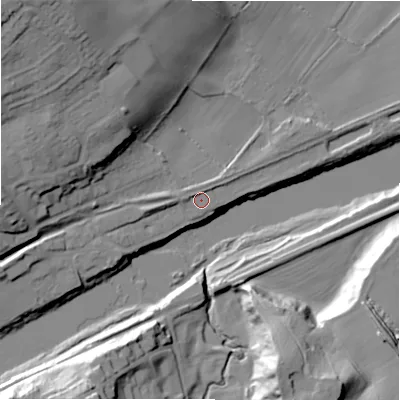 Shaded relief map of the ground around NE418LA, computed from Environment Agency LiDAR. The ground here sits at about 9 m above sea level and falls 37 m across the surrounding 800 m. Surface water reaching this point runs off ground lying to the west, 1.5 m higher.