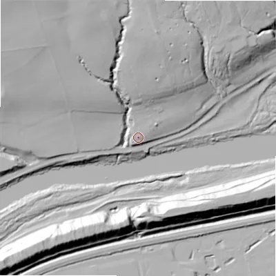 Shaded relief map of the ground around NE426HH, computed from Environment Agency LiDAR. The ground here sits at about 18 m above sea level and falls 39 m across the surrounding 800 m. Surface water reaching this point runs off ground lying to the north-west, 35.3 m higher.