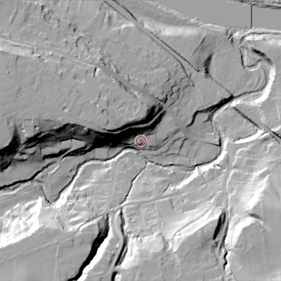 Shaded relief map of the ground around NE446DL, computed from Environment Agency LiDAR. The ground here sits at about 32 m above sea level and falls 46 m across the surrounding 800 m. Surface water reaching this point runs off ground lying to the north-west, 28.6 m higher.