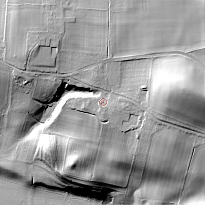 Shaded relief map of the ground around NE455LT, computed from Environment Agency LiDAR. The ground here sits at about 63 m above sea level and falls 58 m across the surrounding 800 m. Surface water reaching this point runs off ground lying to the east, 21.4 m higher.