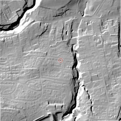 Shaded relief map of the ground around NE462AQ, computed from Environment Agency LiDAR. The ground here sits at about 77 m above sea level and falls 74 m across the surrounding 800 m. Surface water reaching this point runs off ground lying to the south-west, 45.5 m higher.