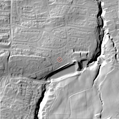 Shaded relief map of the ground around NE462BX, computed from Environment Agency LiDAR. The ground here sits at about 111 m above sea level and falls 85 m across the surrounding 800 m. Surface water reaching this point runs off ground lying to the west, 11.9 m higher.