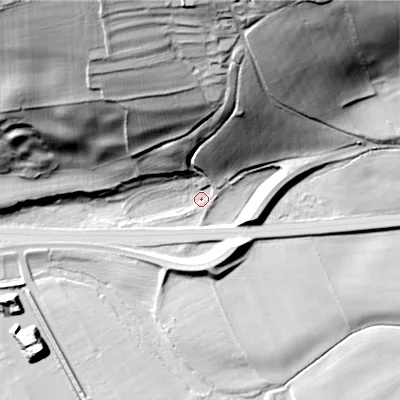 Shaded relief map of the ground around NE464JT, computed from Environment Agency LiDAR. The ground here sits at about 33 m above sea level and falls 73 m across the surrounding 800 m. Surface water reaching this point runs off ground lying to the north-north-west, 64.2 m higher.