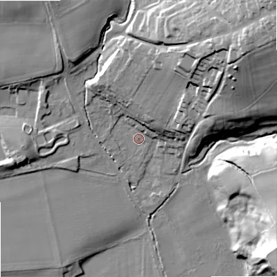 Shaded relief map of the ground around NE464QZ, computed from Environment Agency LiDAR. The ground here sits at about 43 m above sea level and falls 54 m across the surrounding 800 m. Surface water reaching this point runs off ground lying to the north-east, 11.5 m higher.