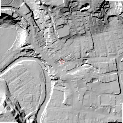 Shaded relief map of the ground around NE611BT, computed from Environment Agency LiDAR. The ground here sits at about 33 m above sea level and falls 44 m across the surrounding 800 m. Surface water reaching this point runs off ground lying to the north, 28.6 m higher.