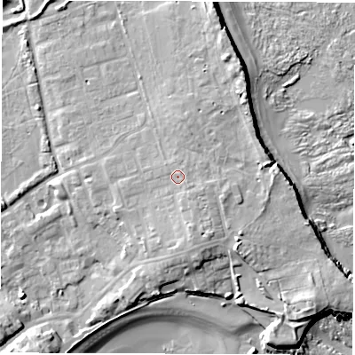 Shaded relief map of the ground around NE646DJ, computed from Environment Agency LiDAR. The ground here sits at about 9 m above sea level and falls 13 m across the surrounding 800 m. Surface water reaching this point runs off ground lying to the south-east, 1.2 m higher.