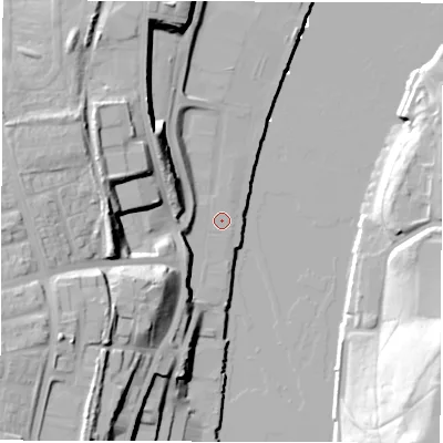 Shaded relief map of the ground around NE64LY, computed from Environment Agency LiDAR. The ground here sits at about 4 m above sea level and falls 36 m across the surrounding 800 m. Surface water reaching this point runs off ground lying to the west, 4.4 m higher.