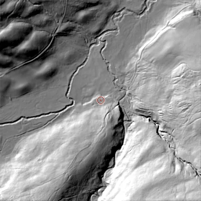 Shaded relief map of the ground around NE657AS, computed from Environment Agency LiDAR. The ground here sits at about 116 m above sea level and falls 89 m across the surrounding 800 m. Surface water reaching this point runs off ground lying to the south, 21.5 m higher.