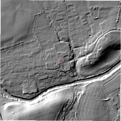 Shaded relief map of the ground around NE663AU, computed from Environment Agency LiDAR. The ground here sits at about 11 m above sea level and falls 22 m across the surrounding 800 m. Surface water reaching this point runs off ground lying to the west-north-west, 2.2 m higher.