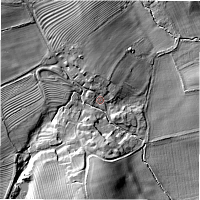 Shaded relief map of the ground around NE663RT, computed from Environment Agency LiDAR. The ground here sits at about 64 m above sea level and falls 23 m across the surrounding 800 m. Surface water reaching this point runs off ground lying to the north, 5.0 m higher.