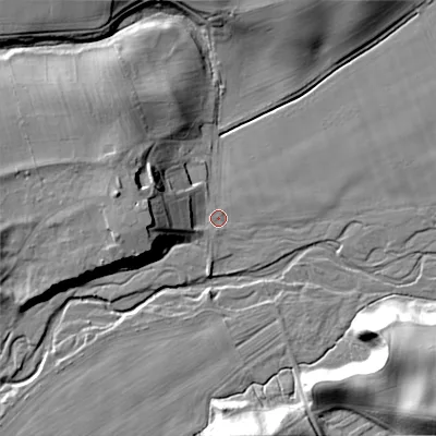 Shaded relief map of the ground around NE664PW, computed from Environment Agency LiDAR. The ground here sits at about 77 m above sea level and falls 26 m across the surrounding 800 m. Surface water reaching this point runs off ground lying to the west, 15.1 m higher.