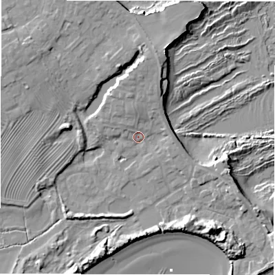 Shaded relief map of the ground around NE675EG, computed from Environment Agency LiDAR. The ground here sits at about 4 m above sea level and falls 14 m across the surrounding 800 m. Surface water reaching this point runs off ground lying to the north, 5.5 m higher.