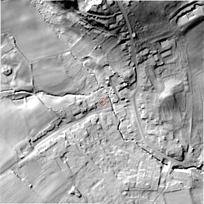 Shaded relief map of the ground around NE707QE, computed from Environment Agency LiDAR. The ground here sits at about 52 m above sea level and falls 52 m across the surrounding 800 m. Surface water reaching this point runs off ground lying to the west-south-west, 2.1 m higher.