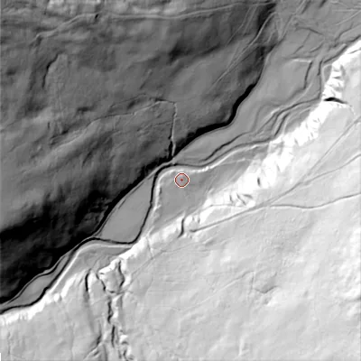 Shaded relief map of the ground around NE716RG, computed from Environment Agency LiDAR. The ground here sits at about 242 m above sea level and falls 137 m across the surrounding 800 m. Surface water reaching this point runs off ground lying to the south-south-east, 85.6 m higher.