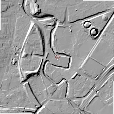 Shaded relief map of the ground around NE82QX, computed from Environment Agency LiDAR. The ground here sits at about 4 m above sea level and falls 19 m across the surrounding 800 m. Surface water reaching this point runs off ground lying to the west-south-west, 12.6 m higher.