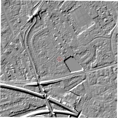Shaded relief map of the ground around NG101AJ, computed from Environment Agency LiDAR. The ground here sits at about 29 m above sea level and falls 7 m across the surrounding 800 m. Surface water reaching this point runs off ground lying to the north, 1.7 m higher.