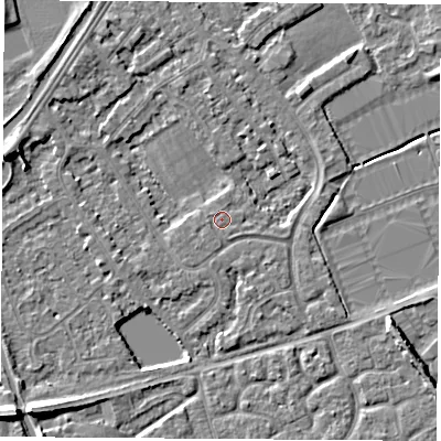 Shaded relief map of the ground around NG101DW, computed from Environment Agency LiDAR. The ground here sits at about 29 m above sea level and falls 7 m across the surrounding 800 m. Surface water reaching this point runs off ground lying to the north, 0.6 m higher.