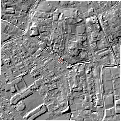 Shaded relief map of the ground around NG101ET, computed from Environment Agency LiDAR. The ground here sits at about 29 m above sea level and falls 5 m across the surrounding 800 m. Surface water reaching this point runs off ground lying to the north-west, 3.9 m higher.