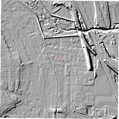 Shaded relief map of the ground around NG101NP, computed from Environment Agency LiDAR. The ground here sits at about 32 m above sea level and falls 11 m across the surrounding 800 m. Surface water reaching this point runs off ground lying to the south, 3.9 m higher.