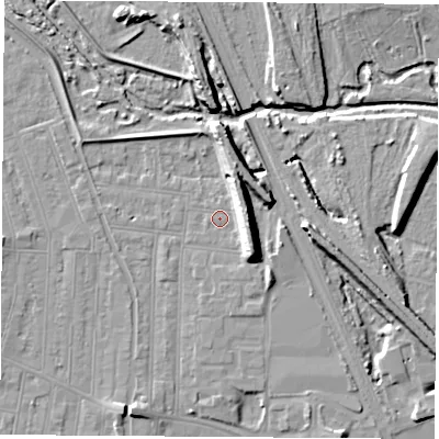 Shaded relief map of the ground around NG101NR, computed from Environment Agency LiDAR. The ground here sits at about 32 m above sea level and falls 13 m across the surrounding 800 m. Surface water reaching this point runs off ground lying to the east-south-east, 8.7 m higher.
