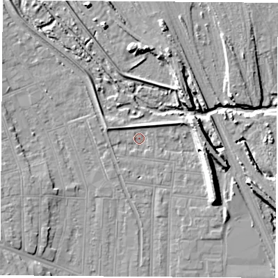 Shaded relief map of the ground around NG101NU, computed from Environment Agency LiDAR. The ground here sits at about 31 m above sea level and falls 11 m across the surrounding 800 m. Surface water reaching this point runs off ground lying to the west-north-west, 2.7 m higher.