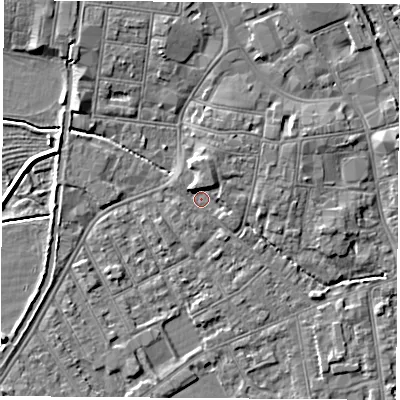 Shaded relief map of the ground around NG101QY, computed from Environment Agency LiDAR. The ground here sits at about 29 m above sea level and falls 5 m across the surrounding 800 m. Surface water reaching this point runs off ground lying to the north-north-west, 2.7 m higher.