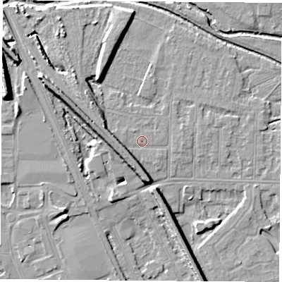 Shaded relief map of the ground around NG102AX, computed from Environment Agency LiDAR. The ground here sits at about 31 m above sea level and falls 13 m across the surrounding 800 m. Surface water reaching this point runs off ground lying to the south-west, 4.5 m higher.