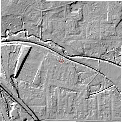Shaded relief map of the ground around NG102BA, computed from Environment Agency LiDAR. The ground here sits at about 31 m above sea level and falls 10 m across the surrounding 800 m. Surface water reaching this point runs off ground lying to the west, 0.8 m higher.
