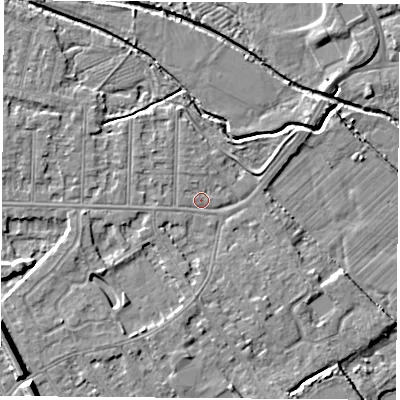 Shaded relief map of the ground around NG102BY, computed from Environment Agency LiDAR. The ground here sits at about 29 m above sea level and falls 9 m across the surrounding 800 m. Surface water reaching this point runs off ground lying to the north-west, 1.3 m higher.