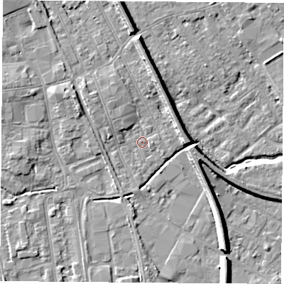 Shaded relief map of the ground around NG102DR, computed from Environment Agency LiDAR. The ground here sits at about 29 m above sea level and falls 8 m across the surrounding 800 m. Surface water reaching this point runs off ground lying to the north, 6.5 m higher.
