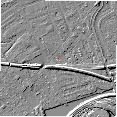 Shaded relief map of the ground around NG103JS, computed from Environment Agency LiDAR. The ground here sits at about 29 m above sea level and falls 8 m across the surrounding 800 m. Surface water reaching this point runs off ground lying to the south-south-east, 5.3 m higher.