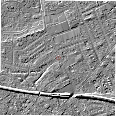 Shaded relief map of the ground around NG103JX, computed from Environment Agency LiDAR. The ground here sits at about 31 m above sea level and falls 7 m across the surrounding 800 m. Surface water reaching this point runs off ground lying to the west-north-west, 1.4 m higher.