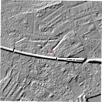 Shaded relief map of the ground around NG103LT, computed from Environment Agency LiDAR. The ground here sits at about 31 m above sea level and falls 7 m across the surrounding 800 m. Surface water reaching this point runs off ground lying to the south, 4.5 m higher.