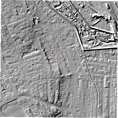 Shaded relief map of the ground around NG104HE, computed from Environment Agency LiDAR. The ground here sits at about 32 m above sea level and falls 9 m across the surrounding 800 m. Surface water reaching this point runs off ground lying to the south, 2.4 m higher.
