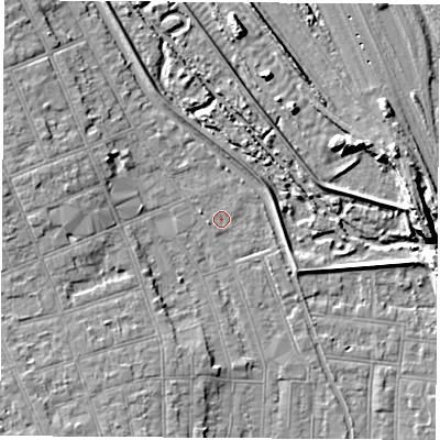 Shaded relief map of the ground around NG104HL, computed from Environment Agency LiDAR. The ground here sits at about 32 m above sea level and falls 9 m across the surrounding 800 m. Surface water reaching this point runs off ground lying to the west-north-west, 1.2 m higher.