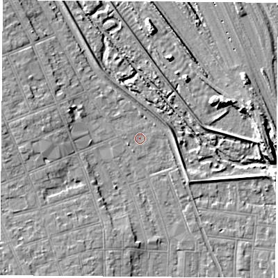 Shaded relief map of the ground around NG104HQ, computed from Environment Agency LiDAR. The ground here sits at about 32 m above sea level and falls 9 m across the surrounding 800 m. Surface water reaching this point runs off ground lying to the west-south-west, 1.2 m higher.