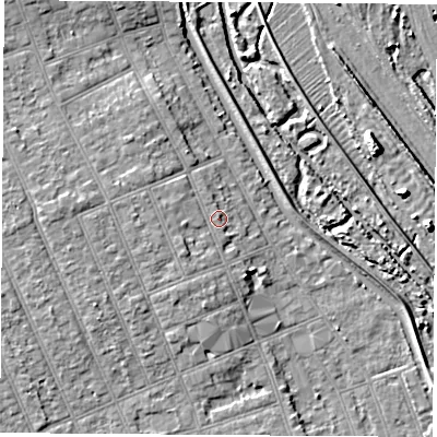 Shaded relief map of the ground around NG104HS, computed from Environment Agency LiDAR. The ground here sits at about 35 m above sea level and falls 7 m across the surrounding 800 m. Surface water reaching this point runs off ground lying to the south-west, 1.5 m higher.