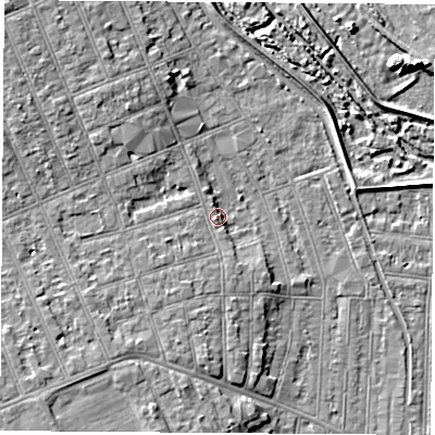 Shaded relief map of the ground around NG104NG, computed from Environment Agency LiDAR. The ground here sits at about 33 m above sea level and falls 7 m across the surrounding 800 m. Surface water reaching this point runs off ground lying to the south-west, 2.2 m higher.