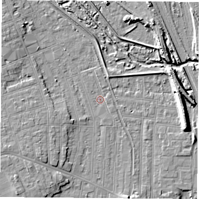 Shaded relief map of the ground around NG104QT, computed from Environment Agency LiDAR. The ground here sits at about 32 m above sea level and falls 11 m across the surrounding 800 m. Surface water reaching this point runs off ground lying to the north-north-east, 1.9 m higher.