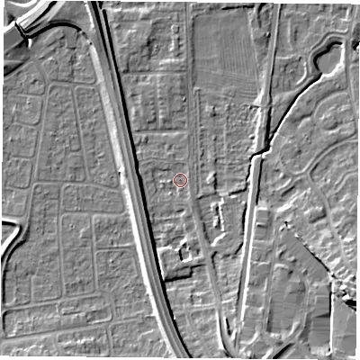 Shaded relief map of the ground around NG117DP, computed from Environment Agency LiDAR. The ground here sits at about 25 m above sea level and falls 13 m across the surrounding 800 m. Surface water reaching this point runs off ground lying to the south-south-east, 7.3 m higher.