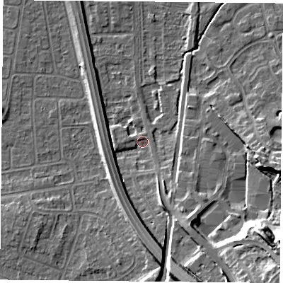 Shaded relief map of the ground around NG117DQ, computed from Environment Agency LiDAR. The ground here sits at about 26 m above sea level and falls 22 m across the surrounding 800 m. Surface water reaching this point runs off ground lying to the south, 9.1 m higher.