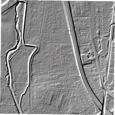 Shaded relief map of the ground around NG117FP, computed from Environment Agency LiDAR. The ground here sits at about 25 m above sea level and falls 14 m across the surrounding 800 m. Surface water reaching this point runs off ground lying to the south-east, 9.3 m higher.