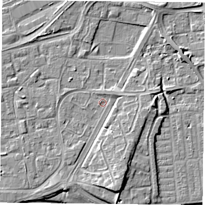 Shaded relief map of the ground around NG21LG, computed from Environment Agency LiDAR. The ground here sits at about 25 m above sea level and falls 10 m across the surrounding 800 m. Surface water reaching this point runs off ground lying to the south, 5.8 m higher.