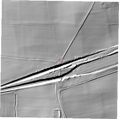 Shaded relief map of the ground around NG220UZ, computed from Environment Agency LiDAR. The ground here sits at about 18 m above sea level and falls 13 m across the surrounding 800 m. Surface water reaching this point runs off ground lying to the west-south-west, 3.4 m higher.