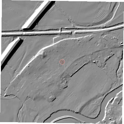 Shaded relief map of the ground around NG241DA, computed from Environment Agency LiDAR. The ground here sits at about 12 m above sea level and falls 12 m across the surrounding 800 m. Surface water reaching this point runs off ground lying to the north-north-west, 2.0 m higher.