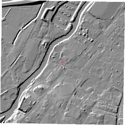 Shaded relief map of the ground around NG241HA, computed from Environment Agency LiDAR. The ground here sits at about 11 m above sea level and falls 12 m across the surrounding 800 m. Surface water reaching this point runs off ground lying to the south, 8.6 m higher.