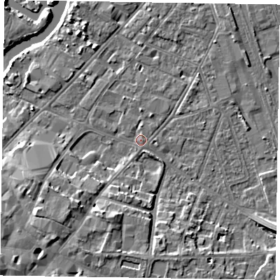 Shaded relief map of the ground around NG241LJ, computed from Environment Agency LiDAR. The ground here sits at about 12 m above sea level and falls 11 m across the surrounding 800 m. Surface water reaching this point runs off ground lying to the north, 1.2 m higher.