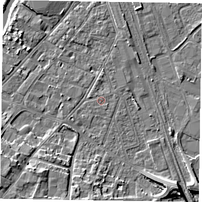 Shaded relief map of the ground around NG241LY, computed from Environment Agency LiDAR. The ground here sits at about 12 m above sea level and falls 11 m across the surrounding 800 m. Surface water reaching this point runs off ground lying to the south-east, 0.7 m higher.